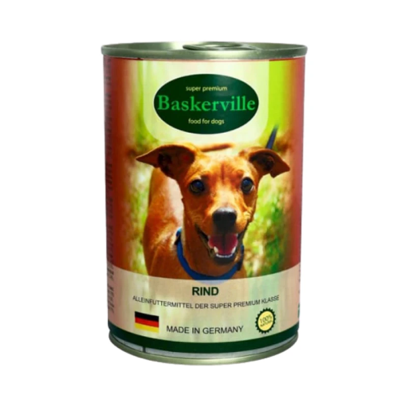Консервована їжа для собак Baskerville Консервована їжа для собак з зображенням щасливого собаки на етикетці.
