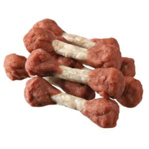 Купка іграшкових кісток для собак, виготовлених з м'ясного матеріалу.