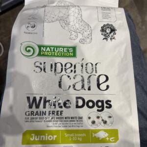 Пакет корму для собак з написом 'White Dogs' та інформацією про беззерновий склад.