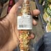 Пакет з фруктовими ласощами для гризунів і кроликів, що містить різноманітні інгредієнти.