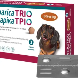 Упаковка жувальних таблеток Simparica Trio для собак масою 5-10 кг з зображенням собаки.